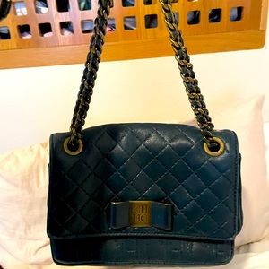 Carolina herrera monogrammed deep leather bag